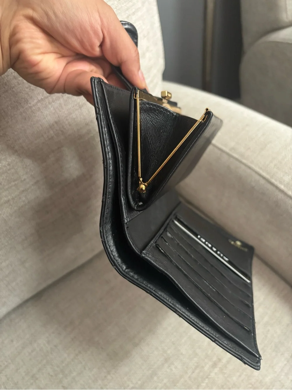 CHANEL Black Quilted Leather Wallet with Gold CC Snap